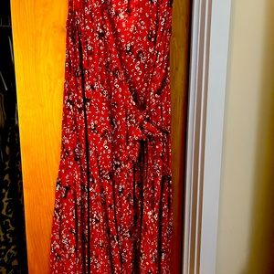Red and white sleeveless wrap dress